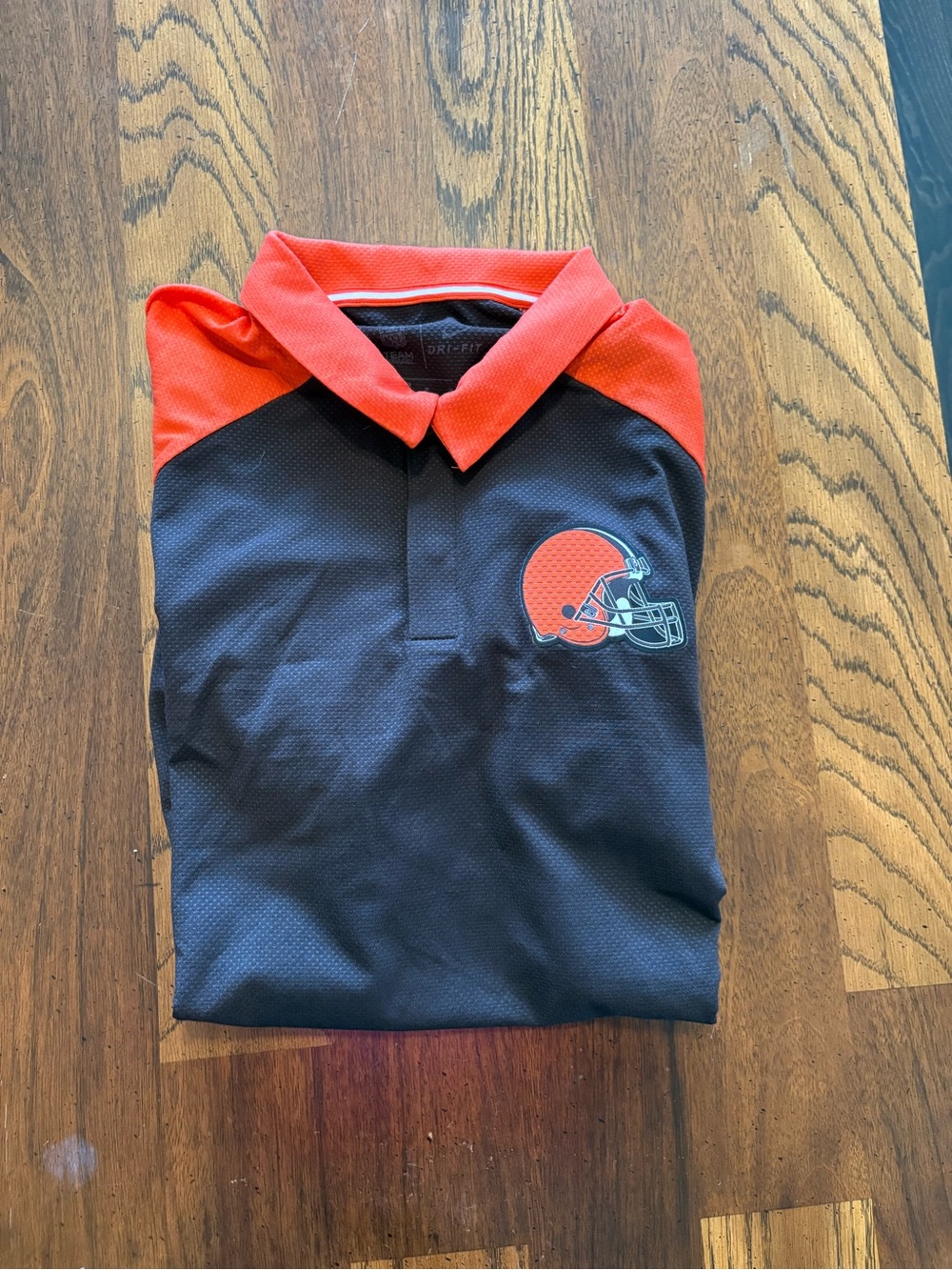 Nike Men's Black and Orange Polo with Team Helmet Logo